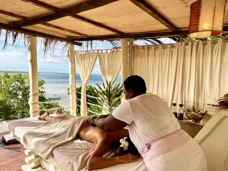 Open-air Jua Spa massage cabana overlooking Mida Creek and the mangrove forest