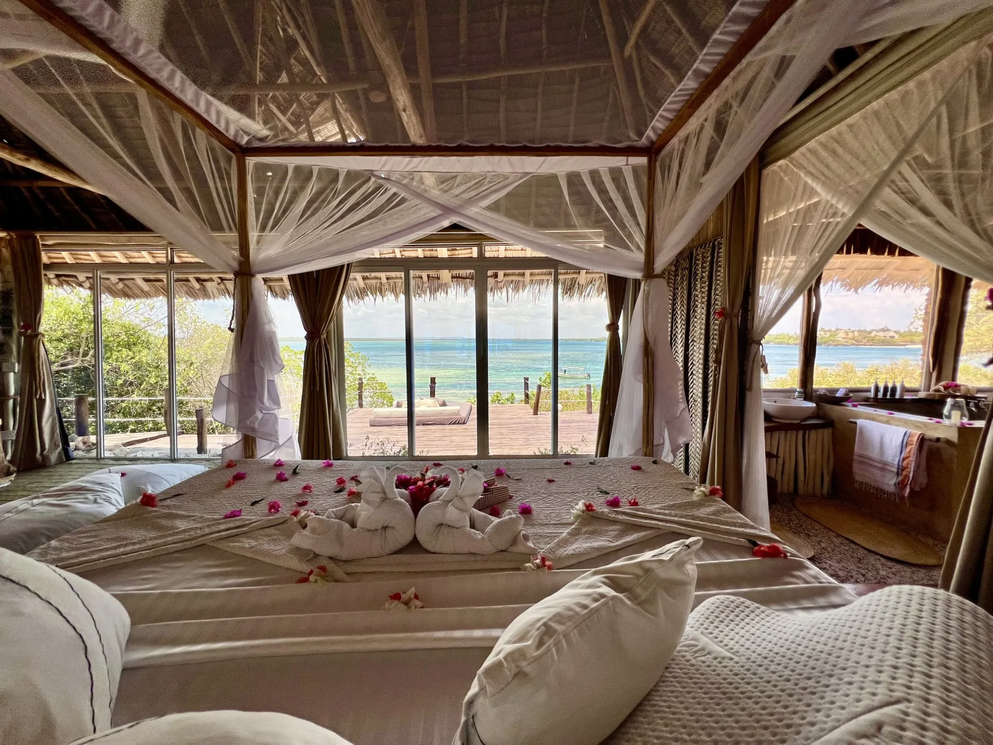 The Imperial Banda suite with its wide wooden terrace looking out over Mida Creek and the ocean